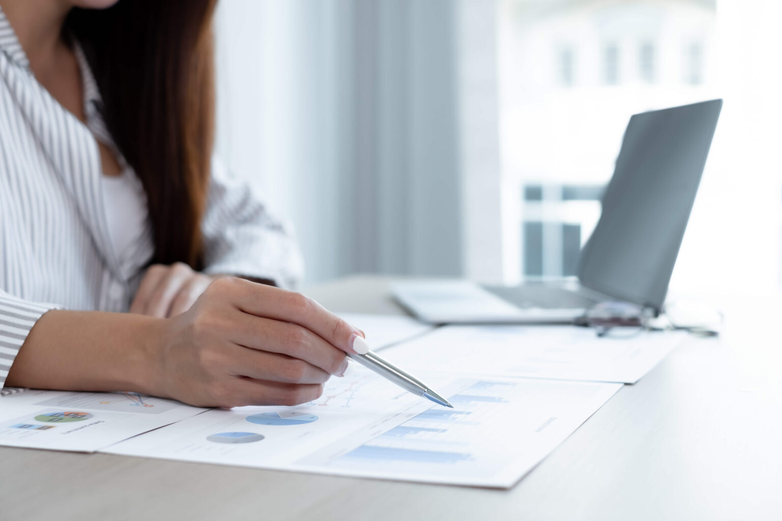 Accountant reviewing books with client